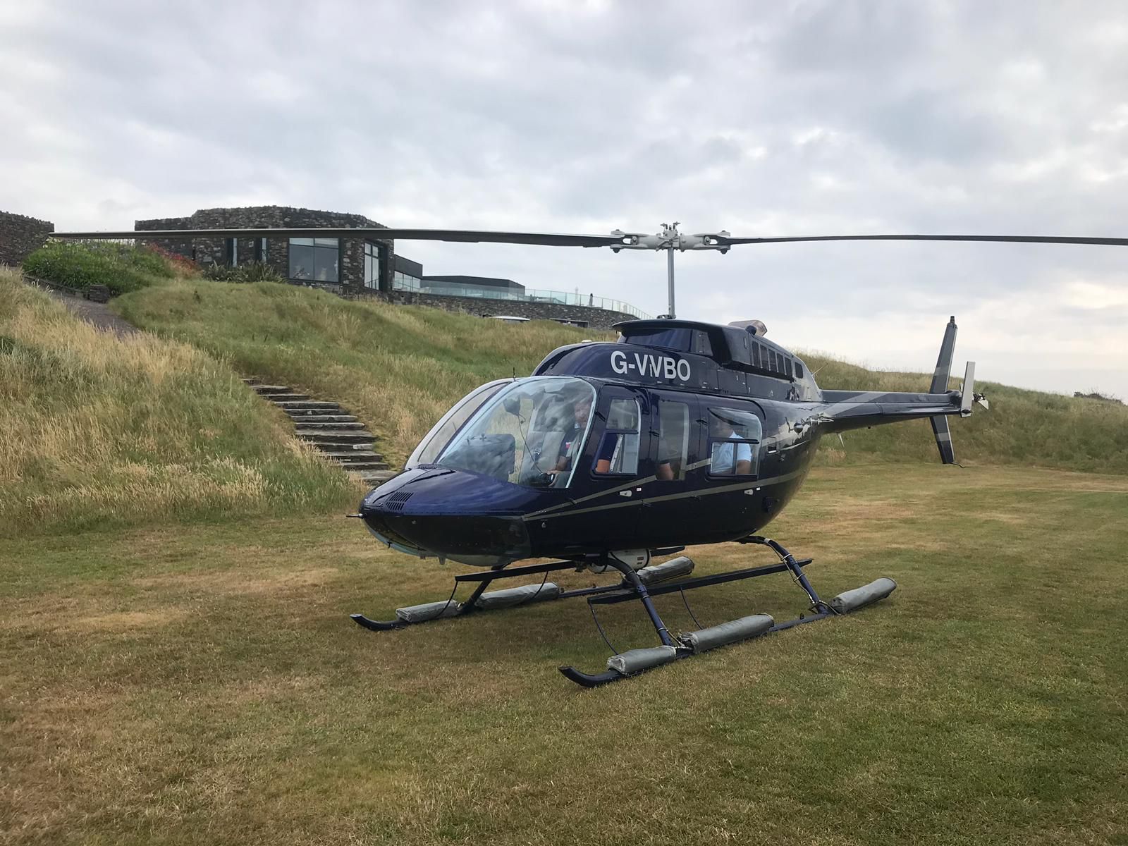 Weddings - Helicopter taking off with bride and groom abroad