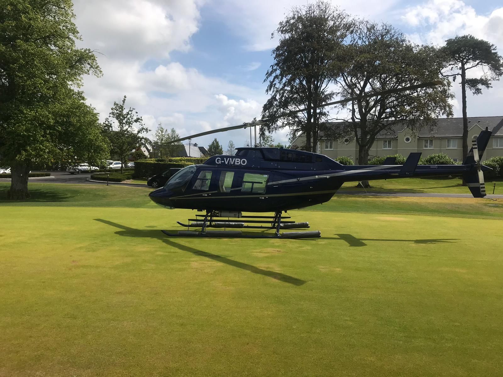 Weddings - The Wedding Party in front of the Robinson R44 Raven I